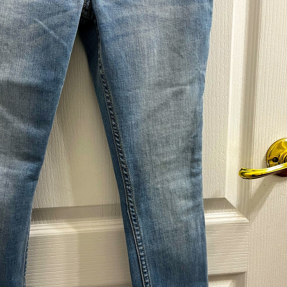Blue low rise super skinny jeans
